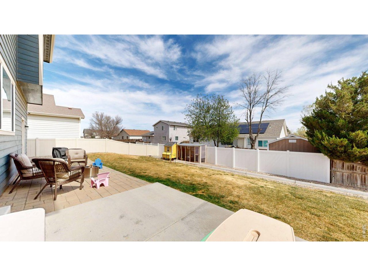 620 Cimarron Trail Ault, CO 80610 - Photo 31 of 37 a balcony with table and chairs