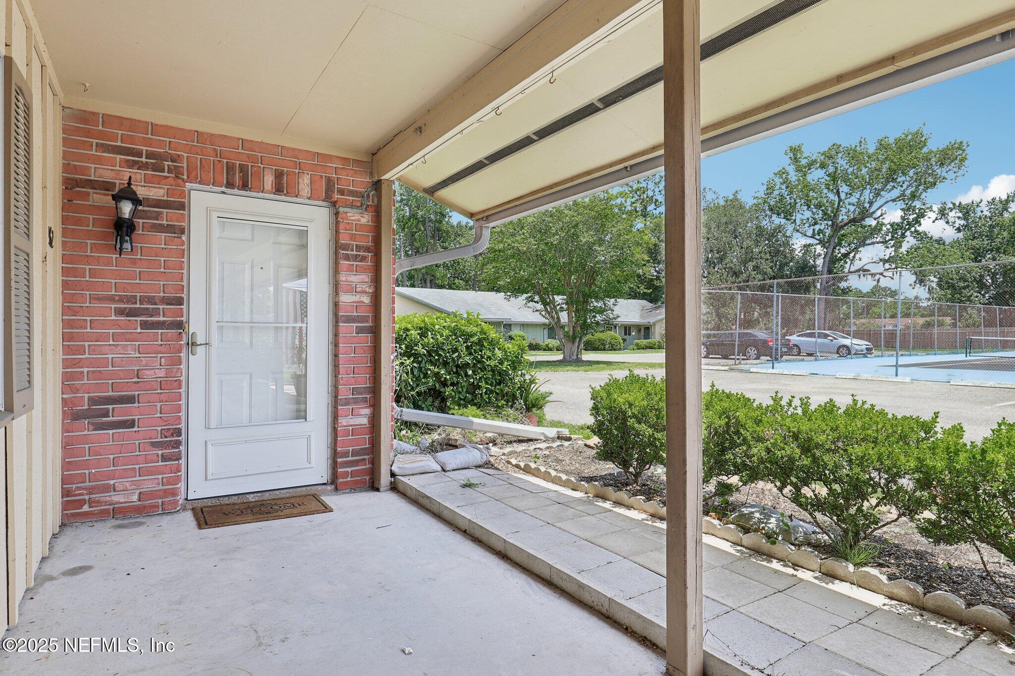 1262 The Grove Road Orange Park, FL 32073 - Photo 11 of 52 Back Screened Lanai