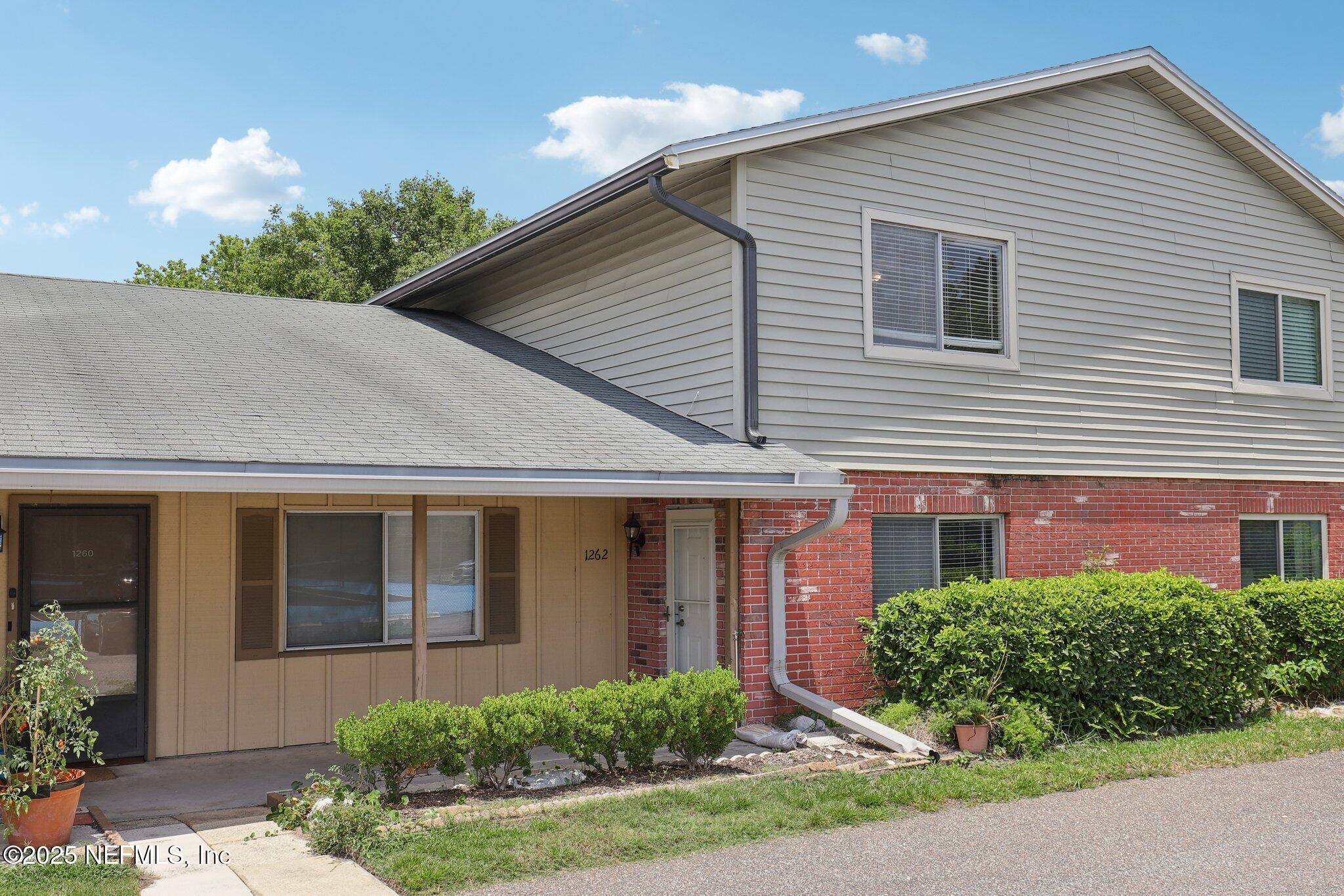 1262 The Grove Road Orange Park, FL 32073 - Photo 30 of 52 Covered Front Entry