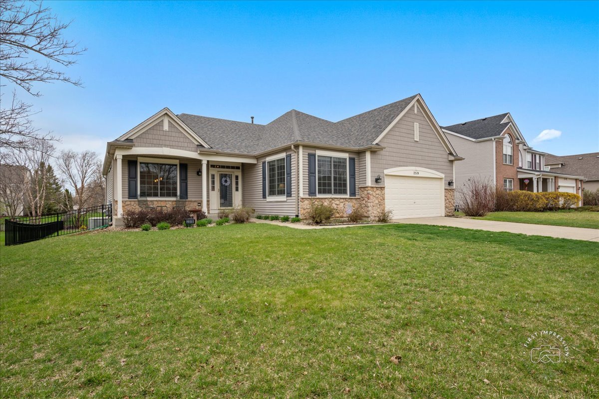 2519 Imgrund Road North Aurora, IL 60542 - Photo 1 of 33 a front view of a house with a yard and garage