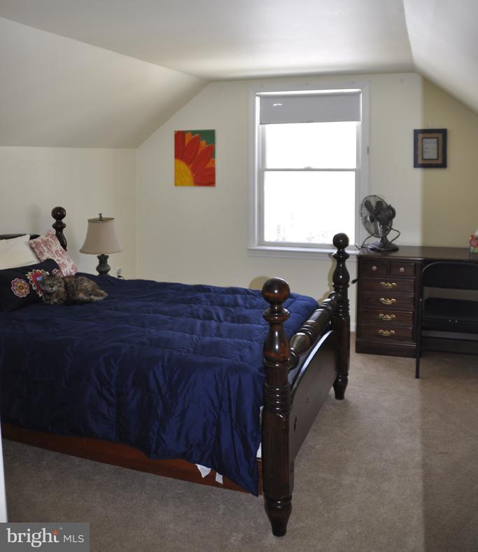 16005 Dark Hollow Road Upperco, MD 21155 - Photo 14 of 17 a bed room with a bed and a window