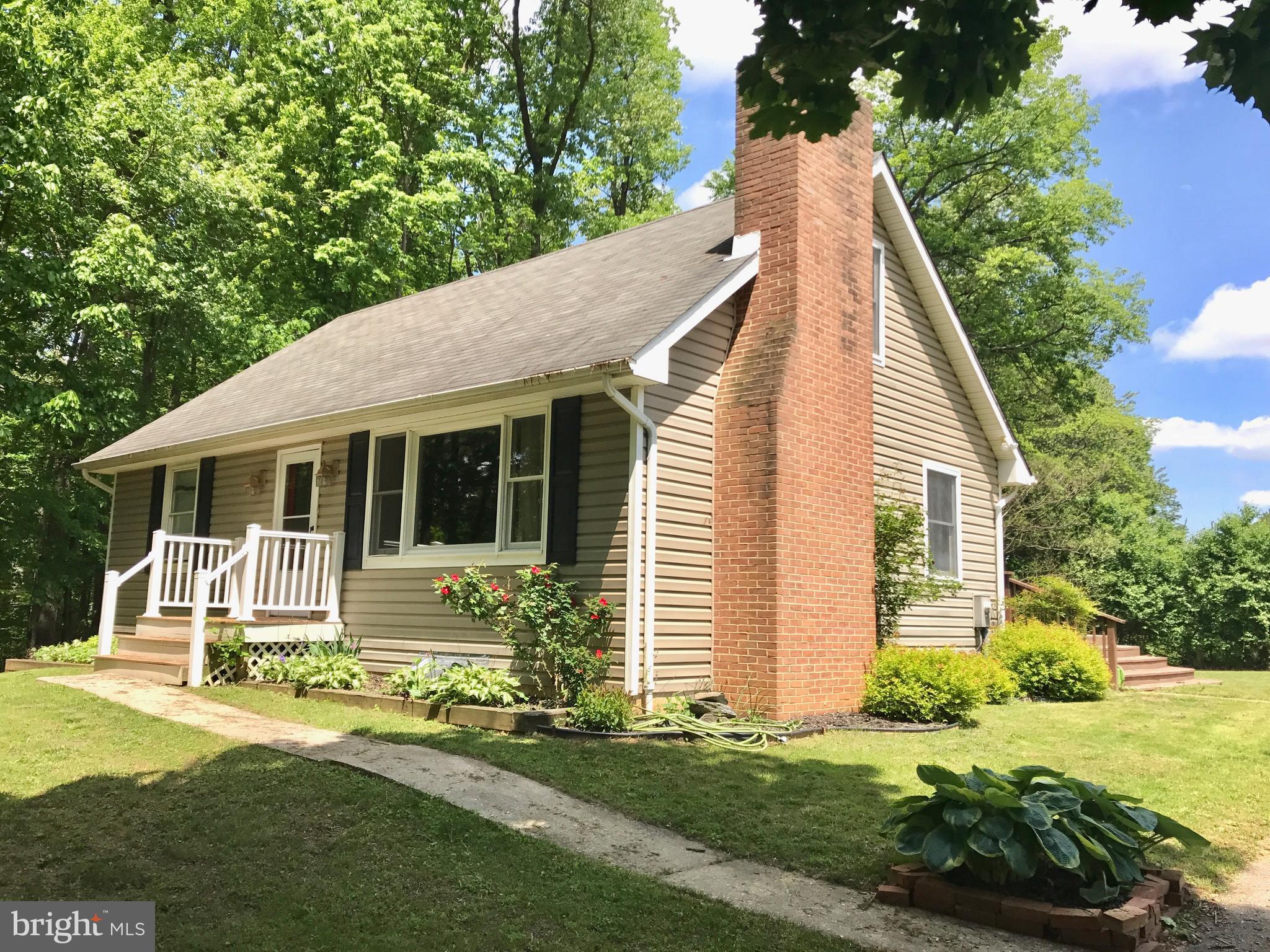 16005 Dark Hollow Road Upperco, MD 21155 - Photo 3 of 17 a view of a house with a yard
