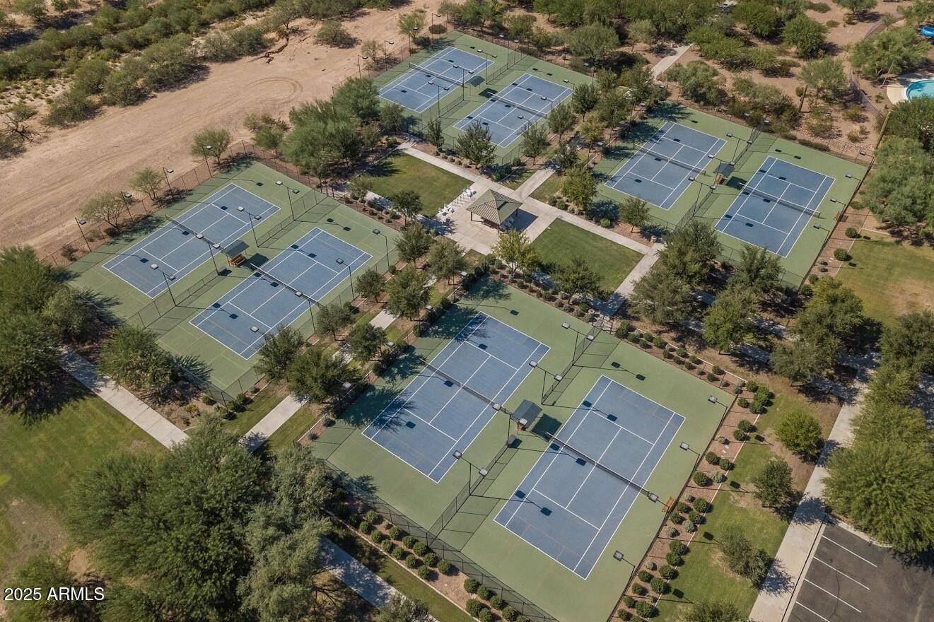 8459 West Gehrig Way Florence, AZ 85132 - Photo 31 of 37 an aerial view of a city with lots of residential buildings