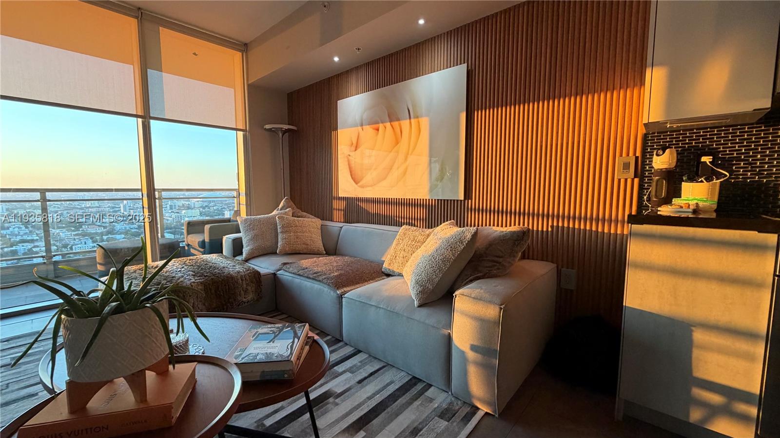 92 Southwest 3rd Street, Unit 3607 Miami, FL 33130 - Photo 5 of 33 a living room with furniture and a large window