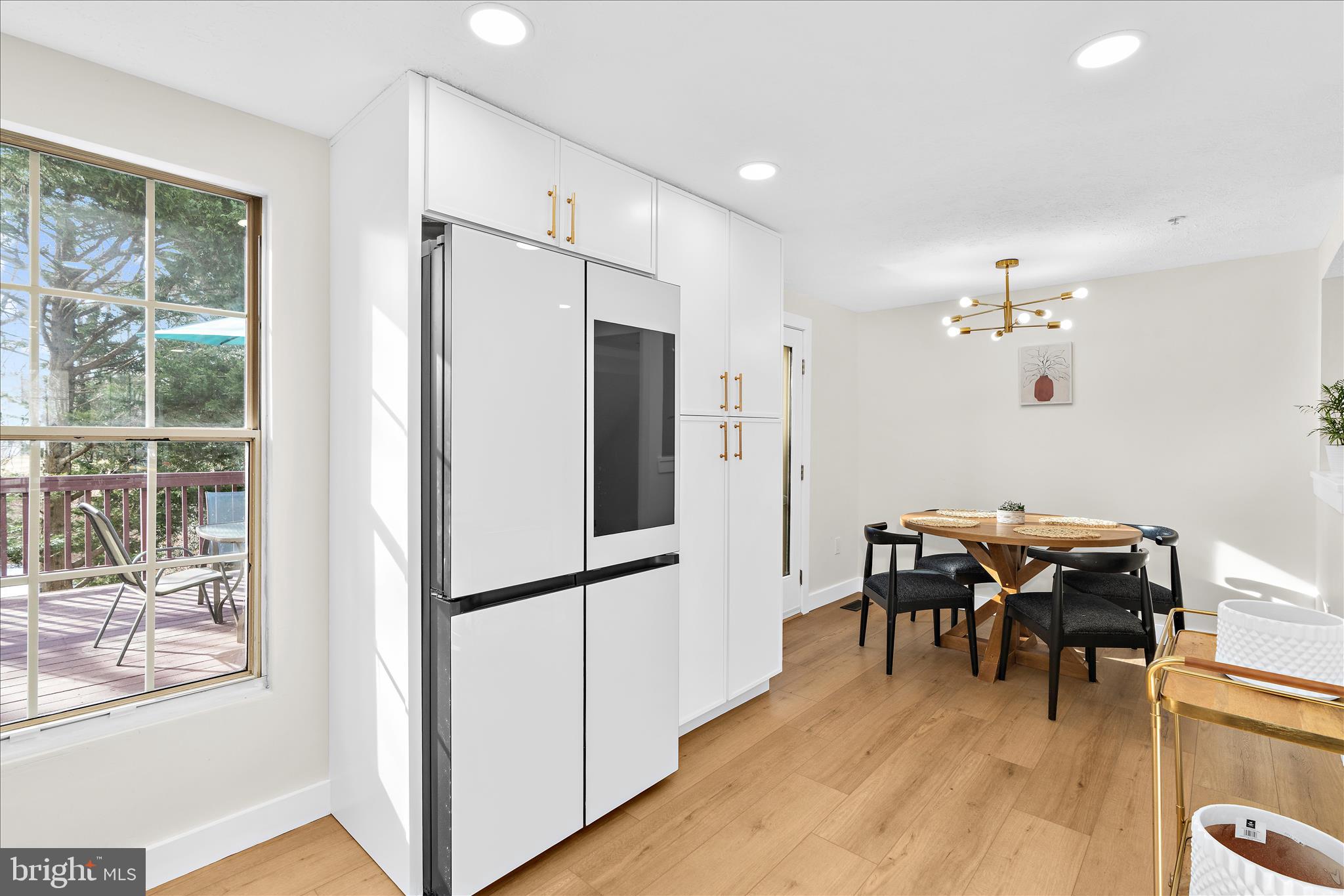 1530 Falstone Lane Crofton, MD 21114 - Photo 14 of 53 a view of a dining room with furniture window and wooden floor