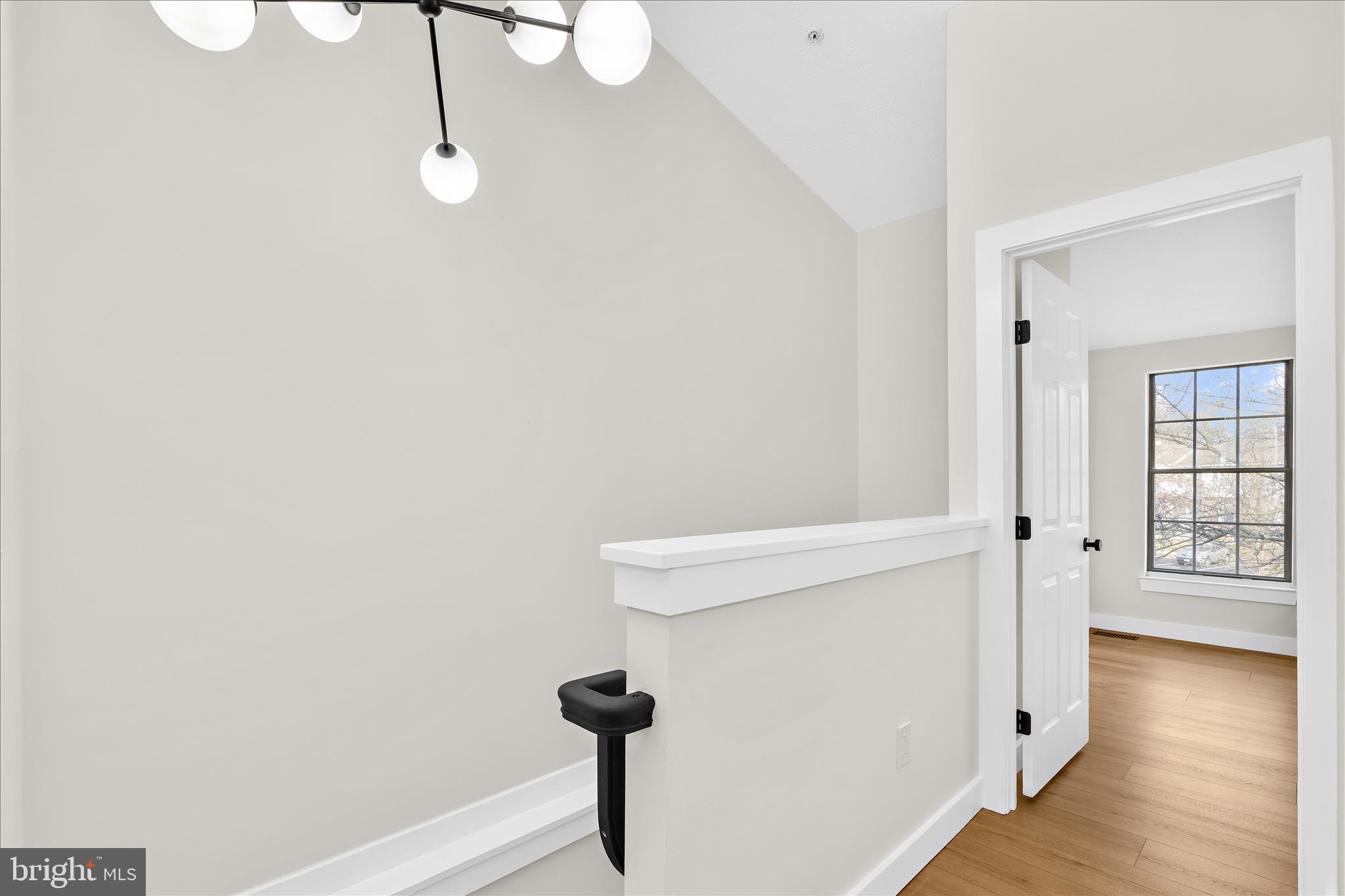 1530 Falstone Lane Crofton, MD 21114 - Photo 20 of 53 a view of an empty room with wooden floor