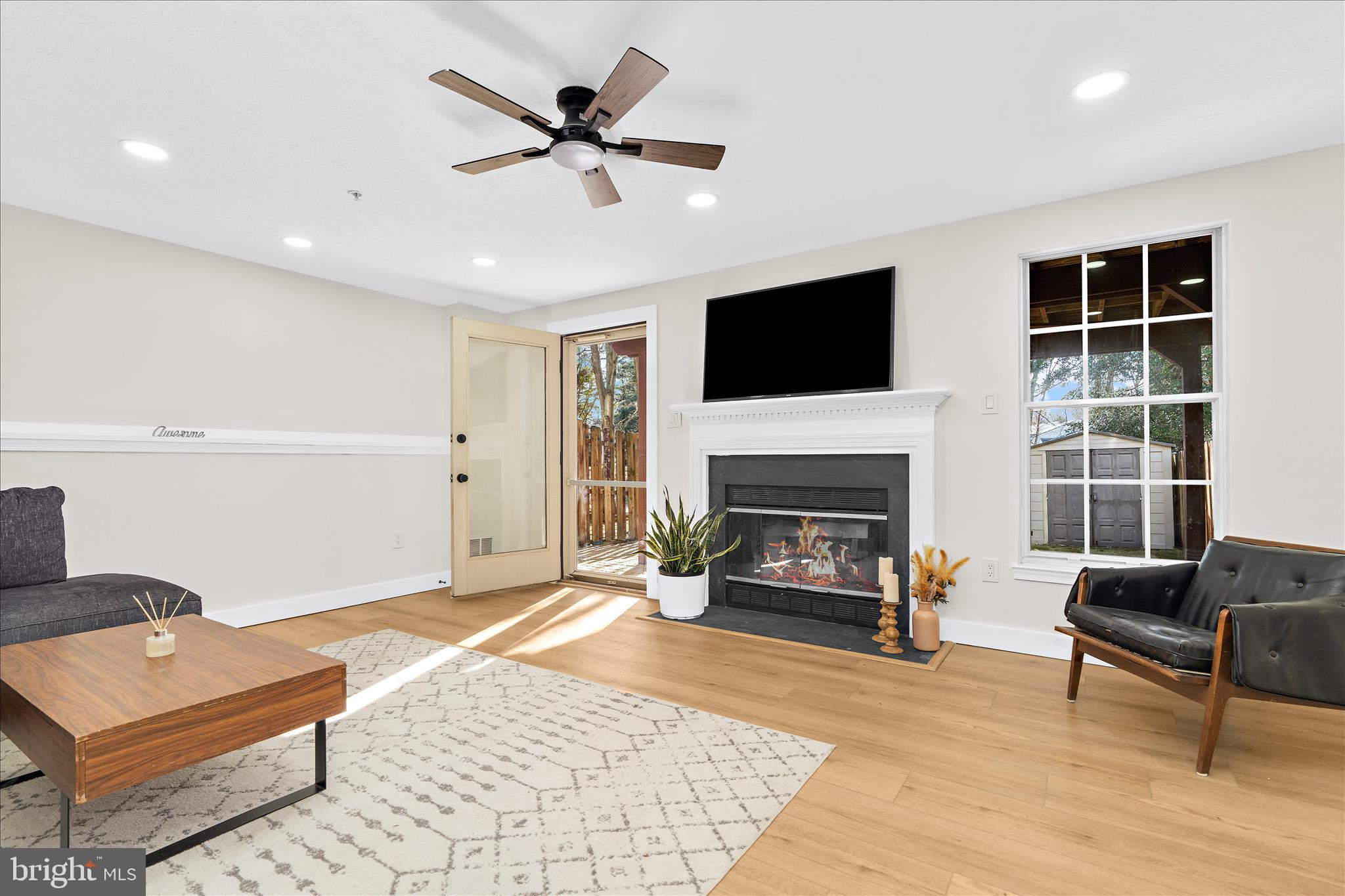 1530 Falstone Lane Crofton, MD 21114 - Photo 35 of 53 a living room with furniture and a fireplace
