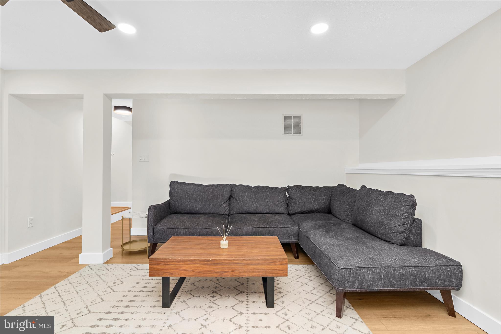 1530 Falstone Lane Crofton, MD 21114 - Photo 38 of 53 a living room with furniture and a rug