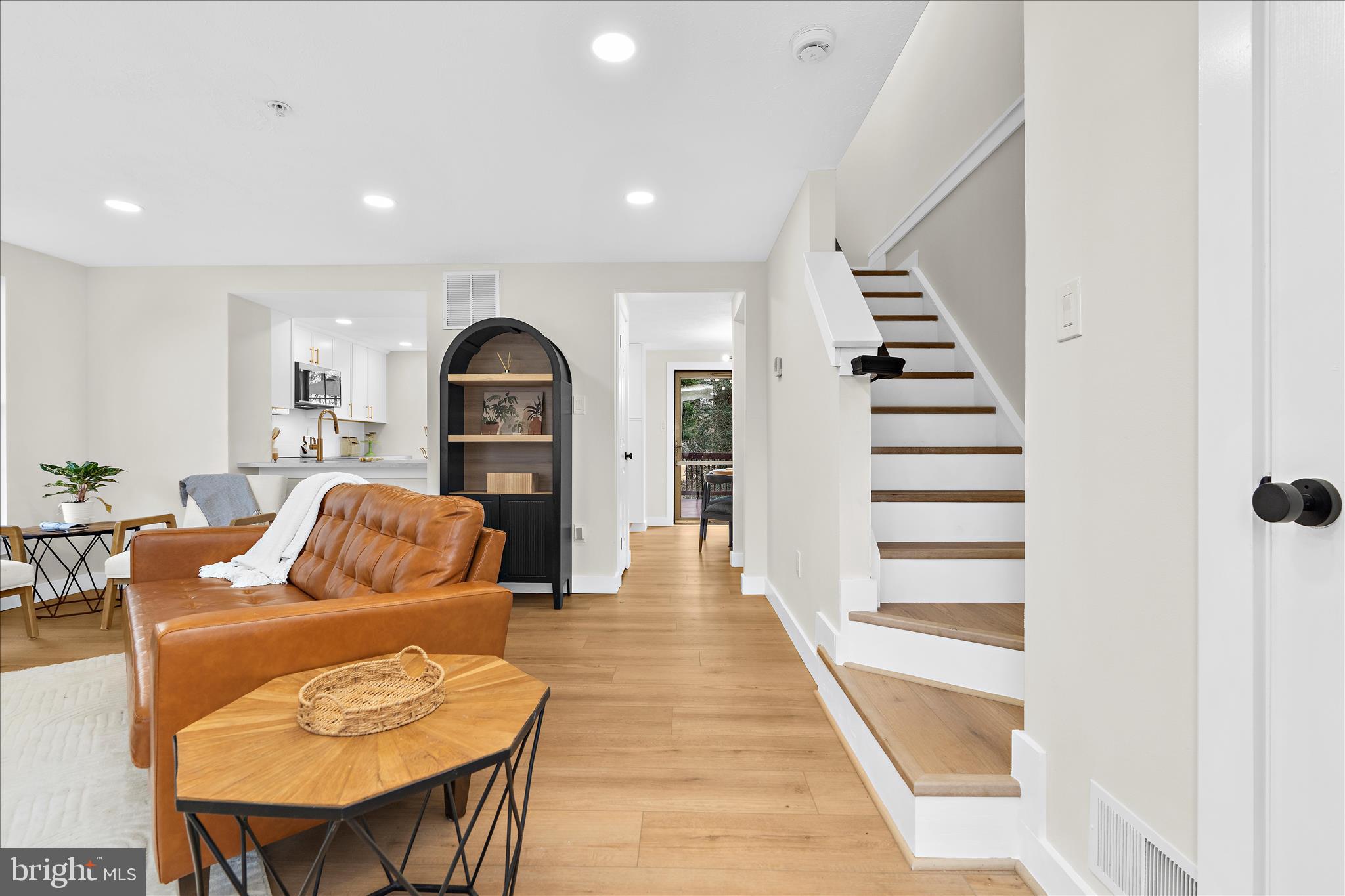1530 Falstone Lane Crofton, MD 21114 - Photo 7 of 53 a living room with furniture and a fireplace