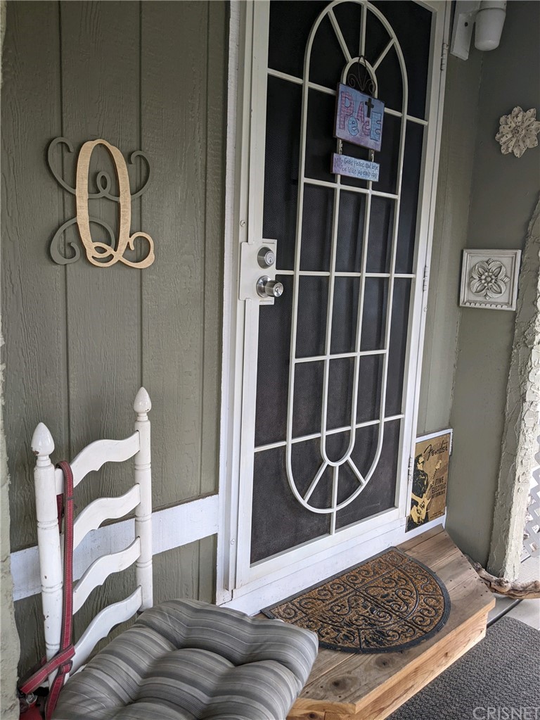 29043 Paradise Road Val Verde, CA 91384 - Photo 3 of 23 a view of a livingroom with furniture and a window