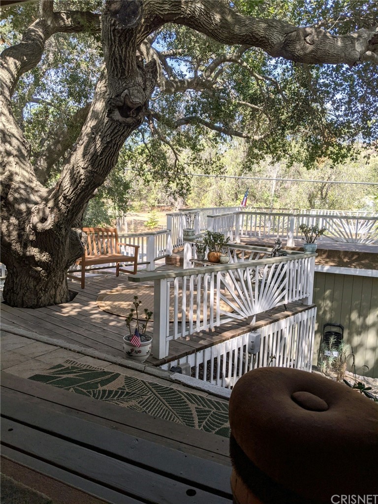 29043 Paradise Road Val Verde, CA 91384 - Photo 4 of 23 a view of a balcony with wooden floor