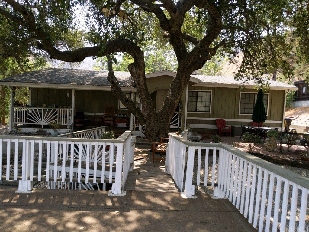 29043 Paradise Road Val Verde, CA 91384 - Photo 5 of 23 a view of house with deck and outdoor seating