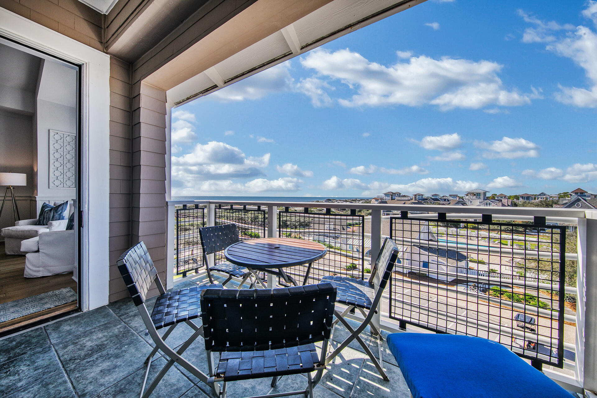 99 Compass Point Way South, Unit 404 Inlet Beach, FL 32461 - Photo 3 of 19 a view of a balcony with furniture