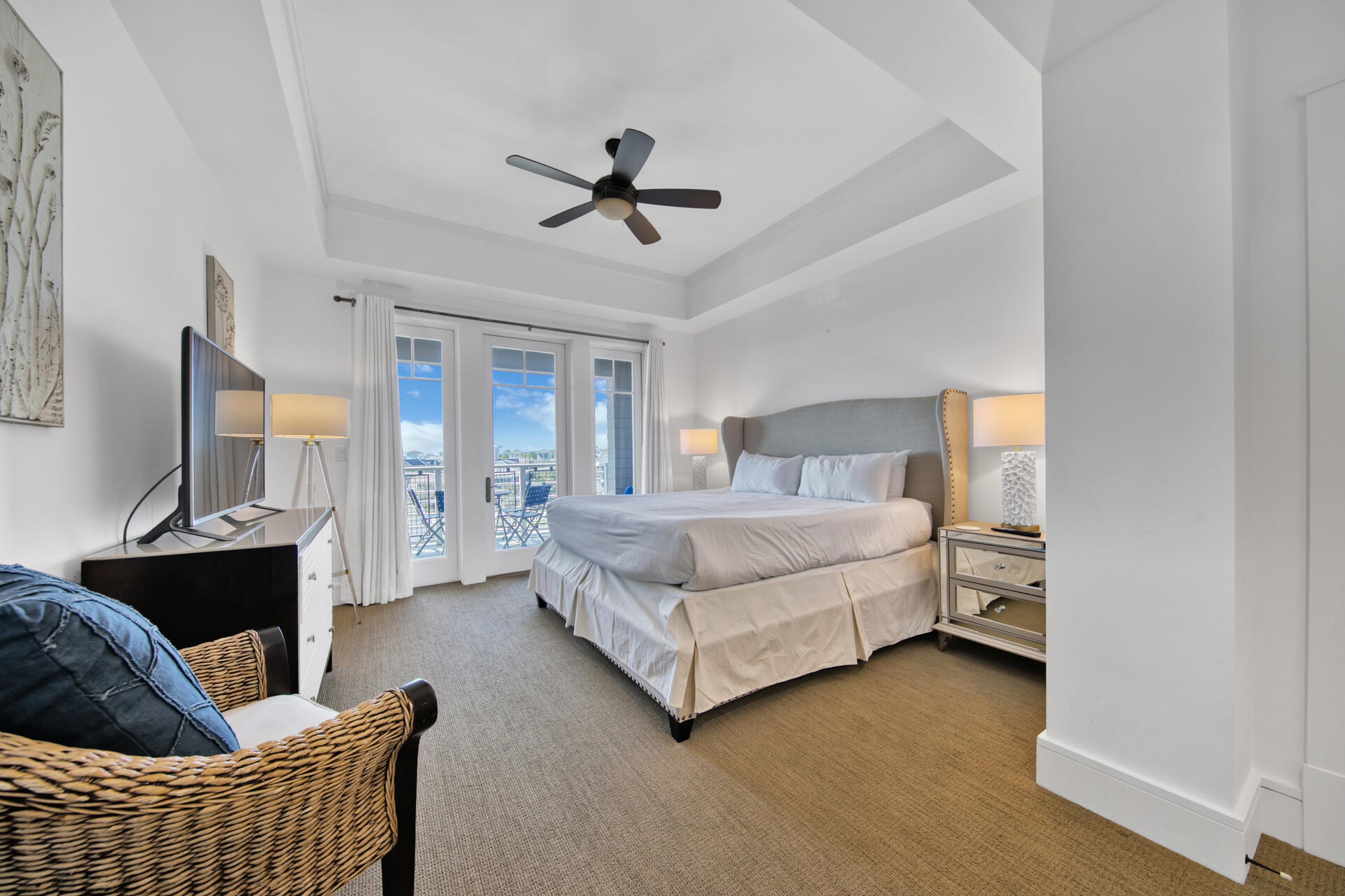 99 Compass Point Way South, Unit 404 Inlet Beach, FL 32461 - Photo 8 of 19 a bedroom with a bed couch and a window
