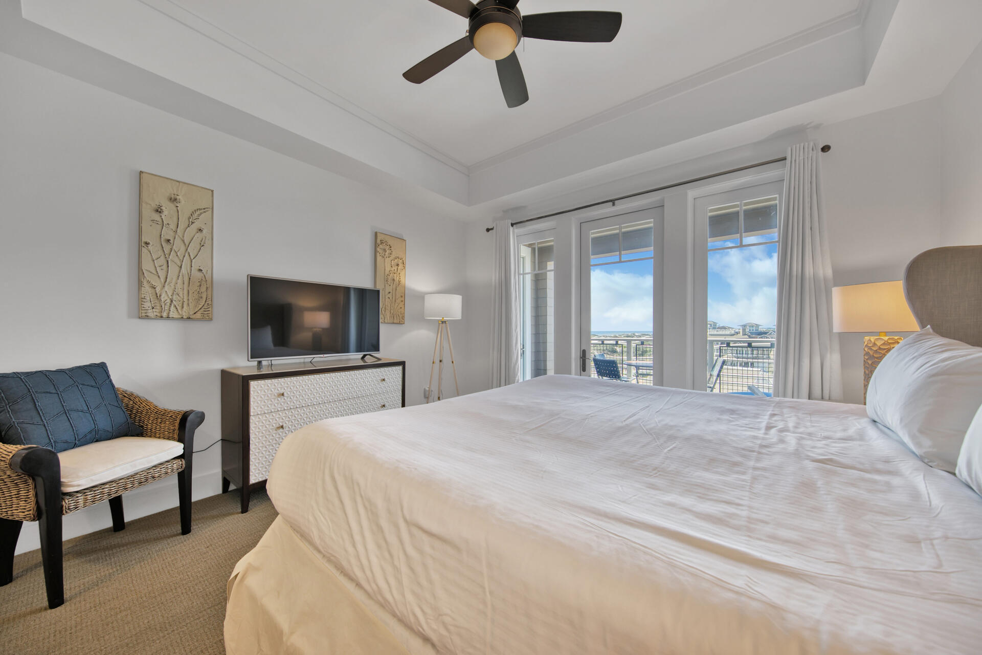 99 Compass Point Way South, Unit 404 Inlet Beach, FL 32461 - Photo 9 of 19 a bedroom with a bed and a television