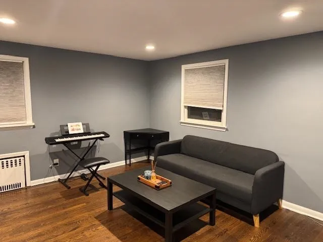 a living room with furniture and a window