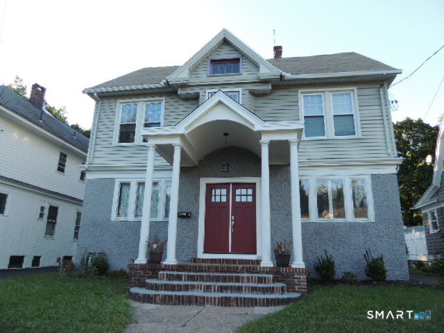 1546 Whitney Avenue Hamden, CT 06517 - Photo 2 of 21 a front view of a house with garden