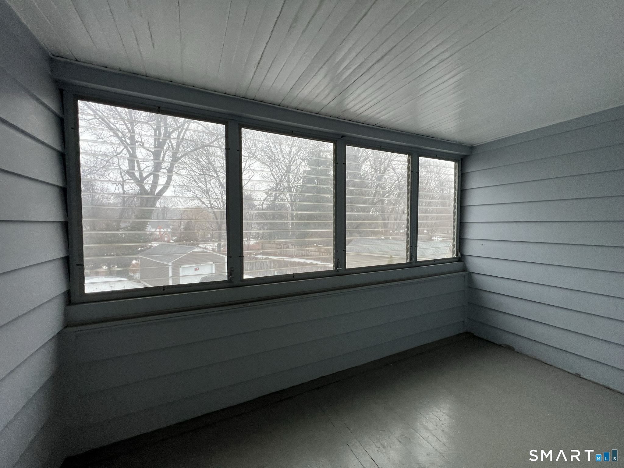 1546 Whitney Avenue Hamden, CT 06517 - Photo 7 of 21 a view of empty room with large windows
