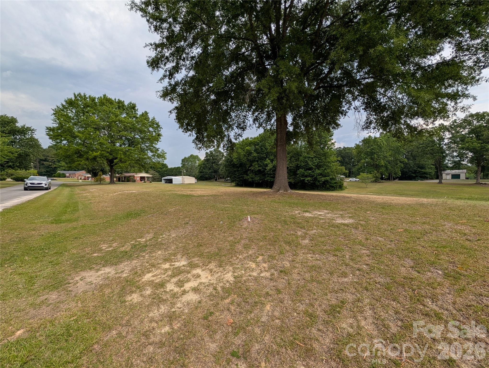 0 Diana Road, Unit 20/21 Cherryville, NC 28021 - Photo 5 of 5 a view of a large trees with lawn chairs