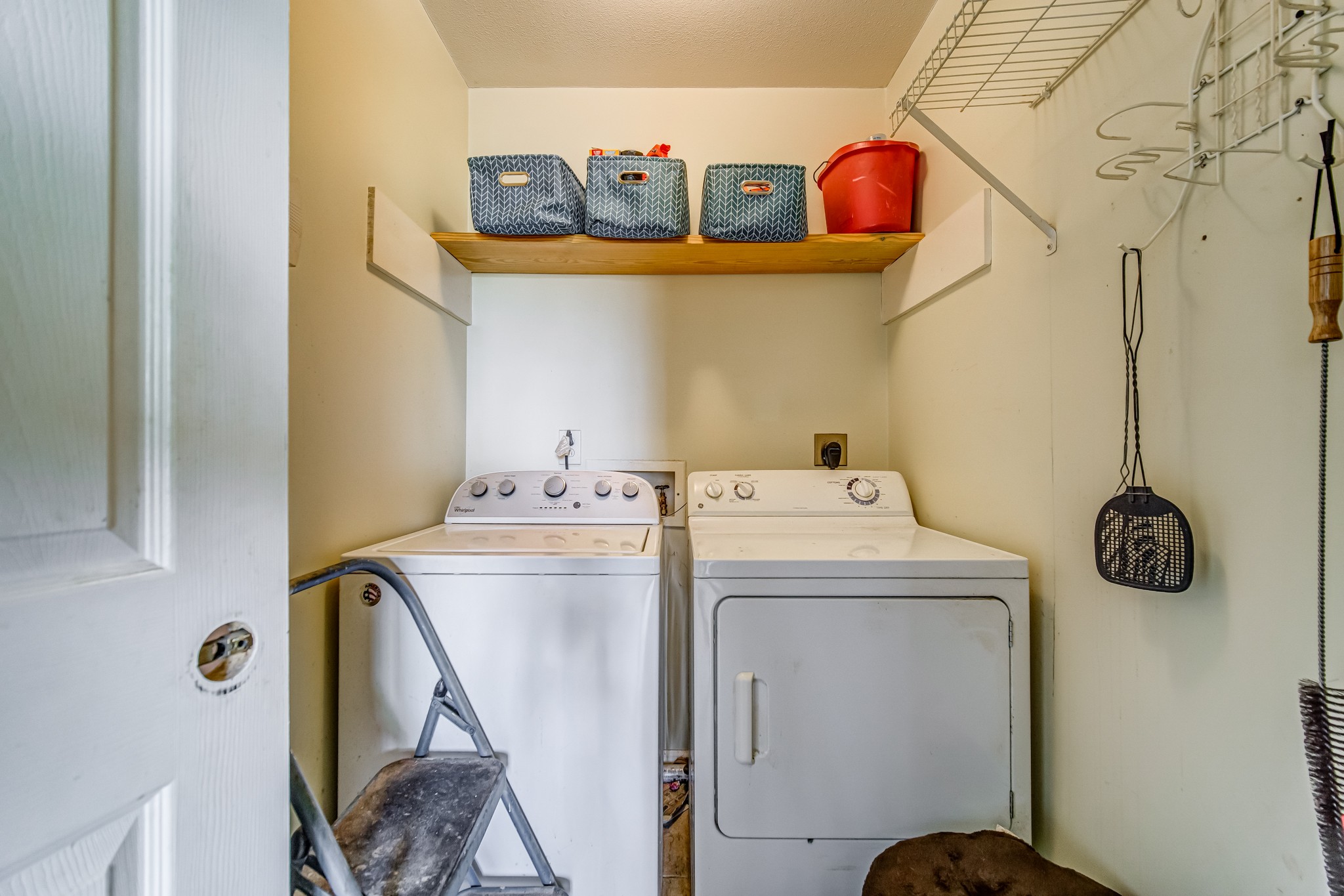 5407 Marion Road Cunningham, TN 37052 - Photo 20 of 35 a view of storage and utility room with washer and dryer