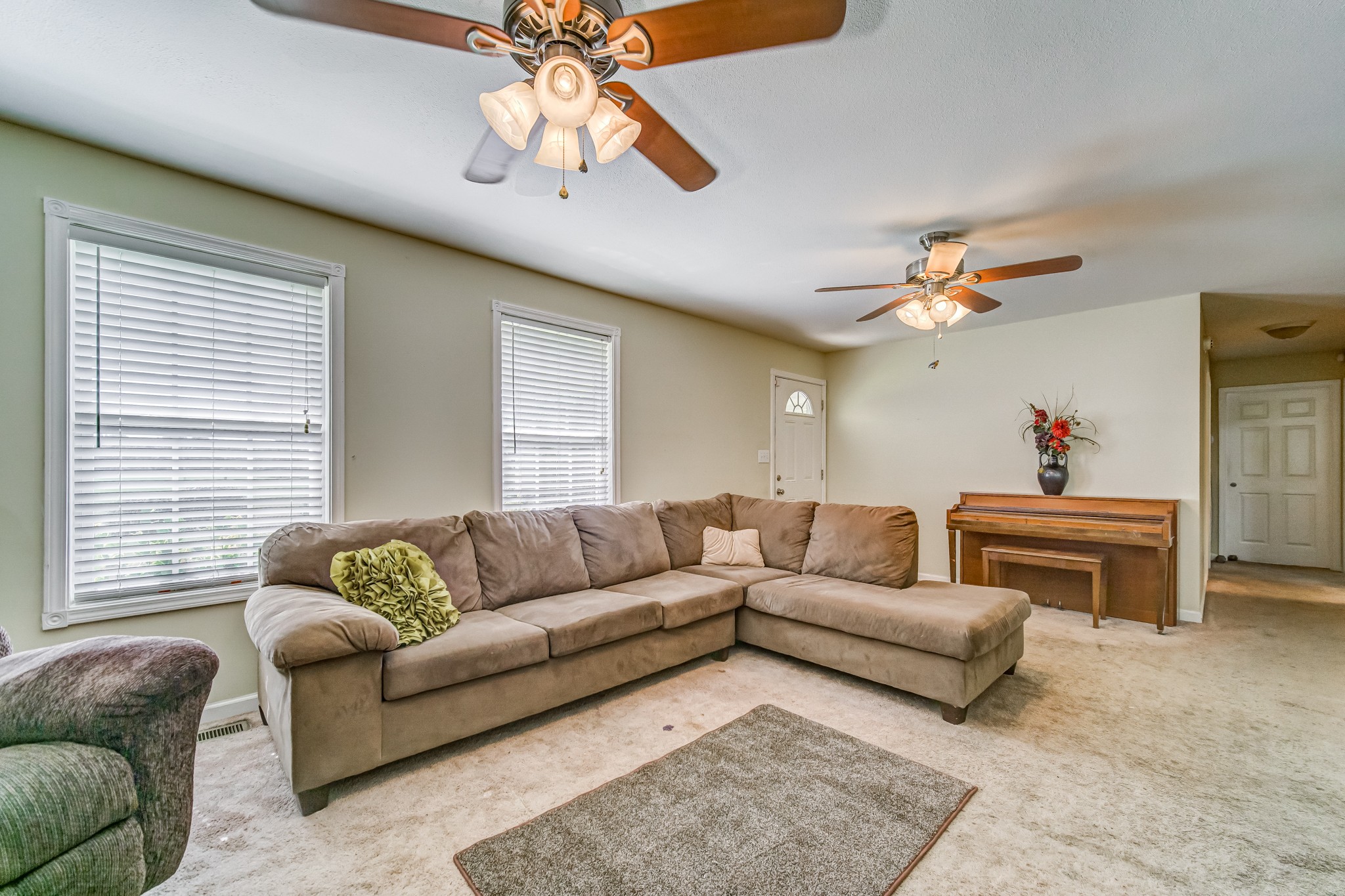5407 Marion Road Cunningham, TN 37052 - Photo 2 of 35 a living room with furniture ceiling fan and a window