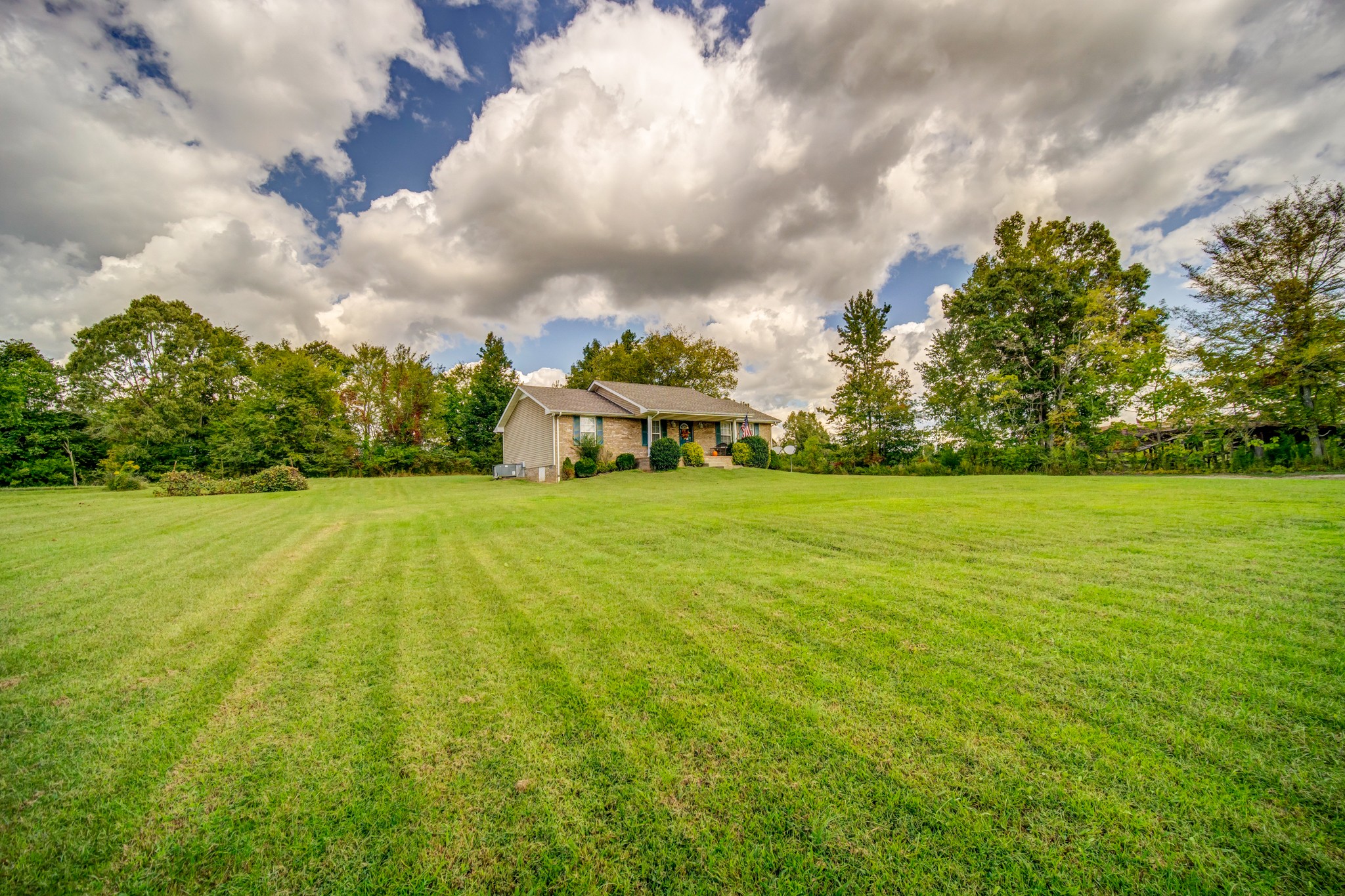5407 Marion Road Cunningham, TN 37052 - Photo 24 of 35 a view of yard with swimming pool and green space