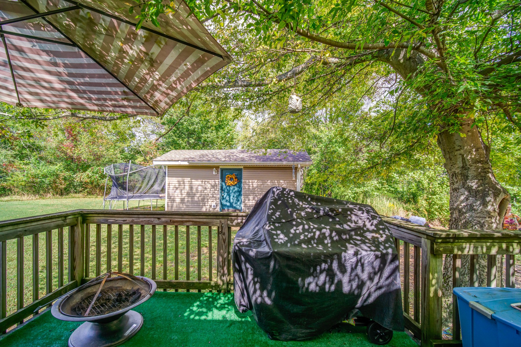 5407 Marion Road Cunningham, TN 37052 - Photo 33 of 35 a view of a wooden deck with a backyard