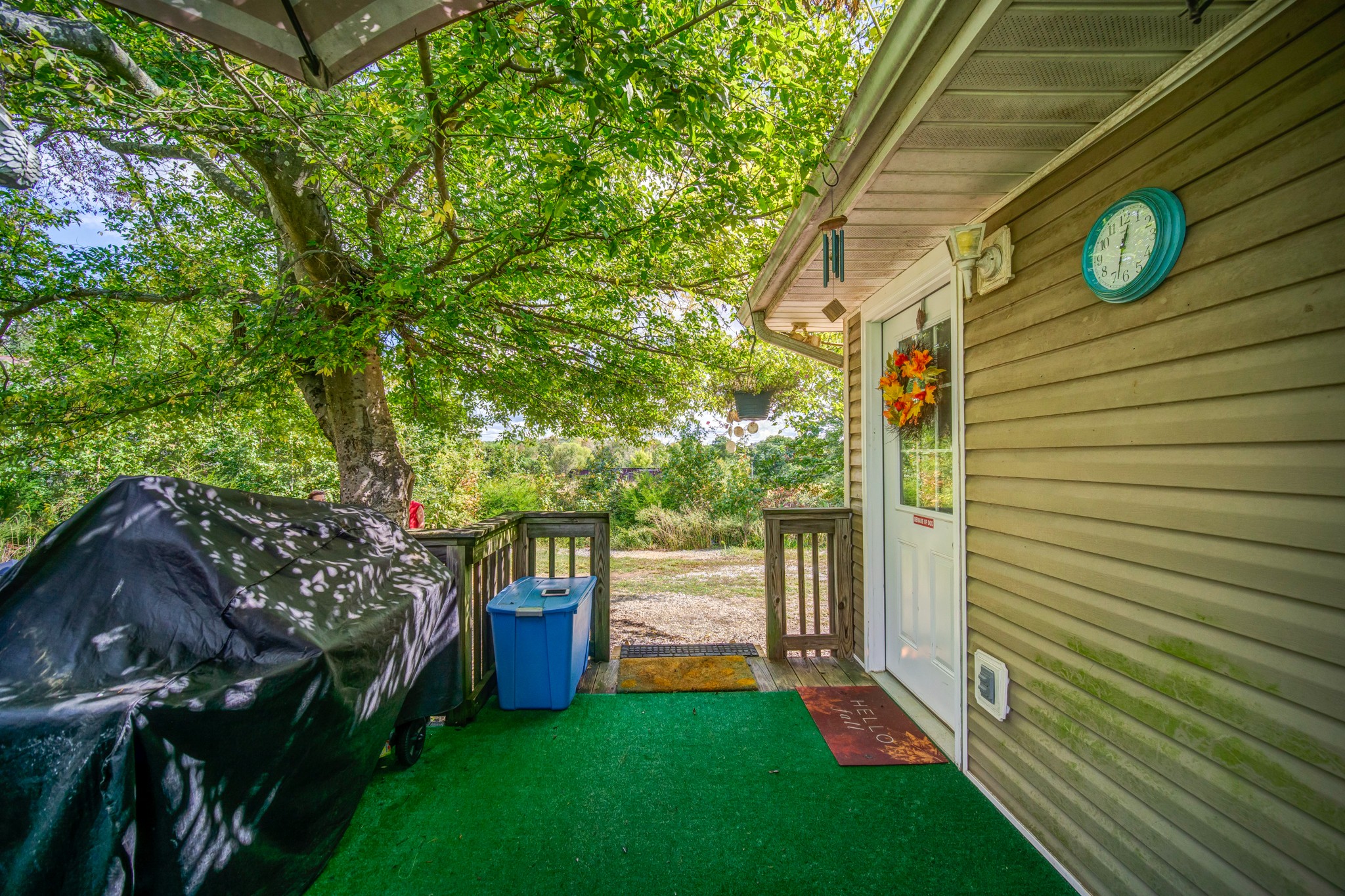 5407 Marion Road Cunningham, TN 37052 - Photo 34 of 35 a view of a house with a backyard