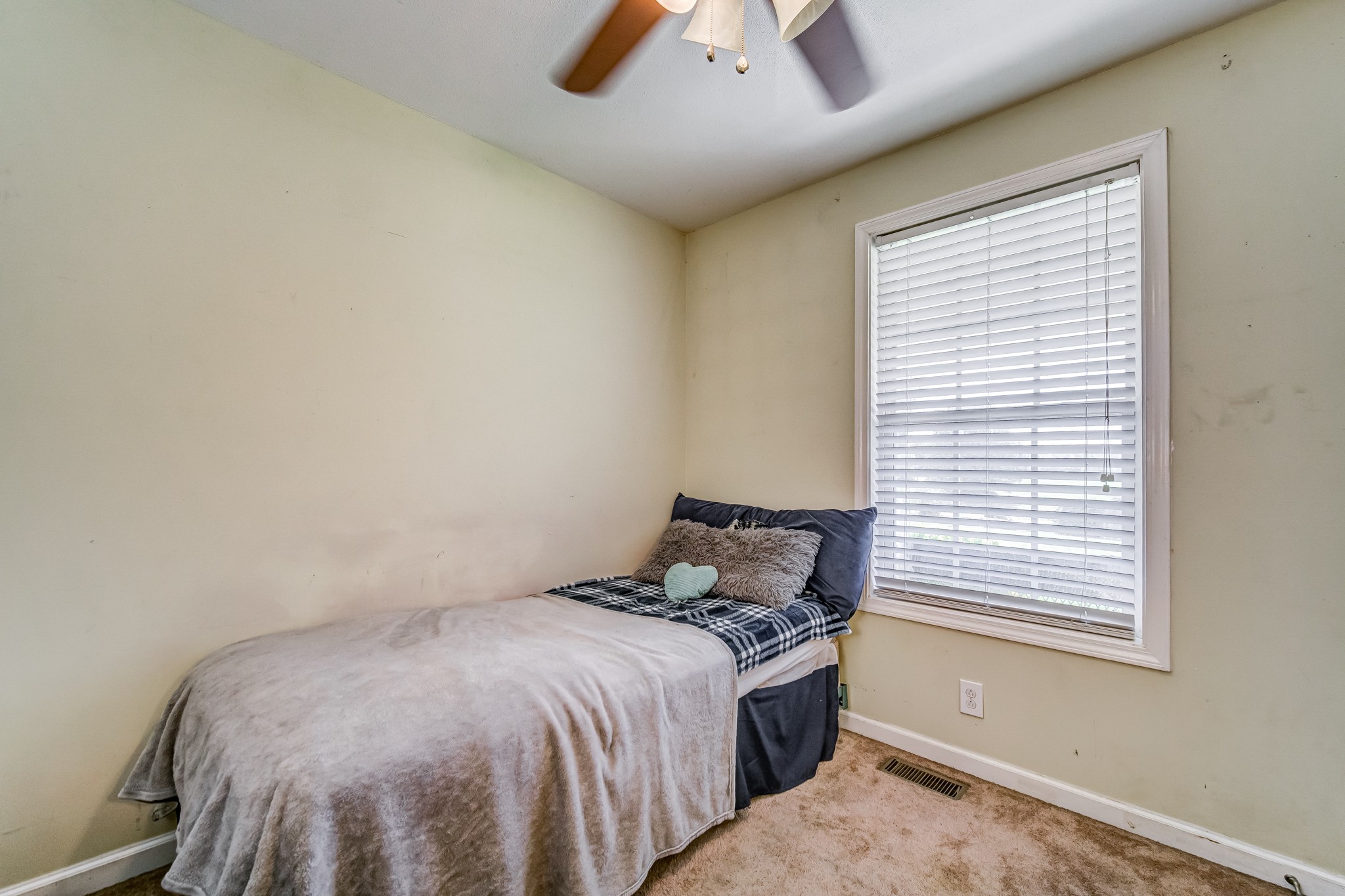 5407 Marion Road Cunningham, TN 37052 - Photo 10 of 35 a bedroom with a bed and a window