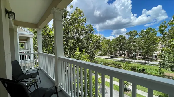 a view of a porch with a yard
