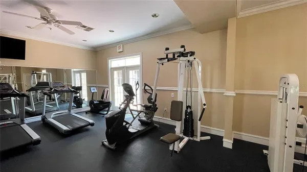 a view of a room with gym equipment