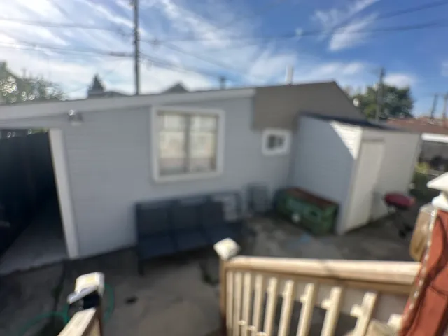 a bathroom with a toilet sink and a mirror