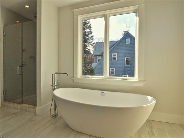 5 Kennard Road Brookline, MA 02445 - Photo 11 of 14 a bathroom with a bathtub and shower