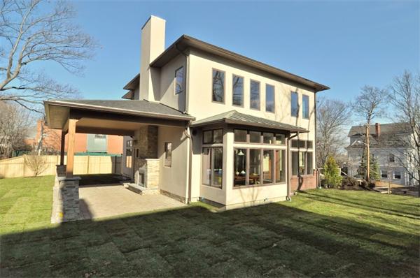5 Kennard Road Brookline, MA 02445 - Photo 13 of 14 a front view of a house with a yard