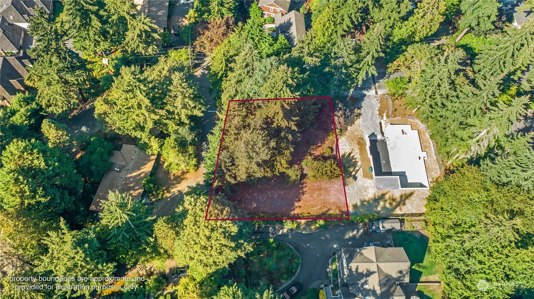 an aerial view of a house with yard and outdoor space