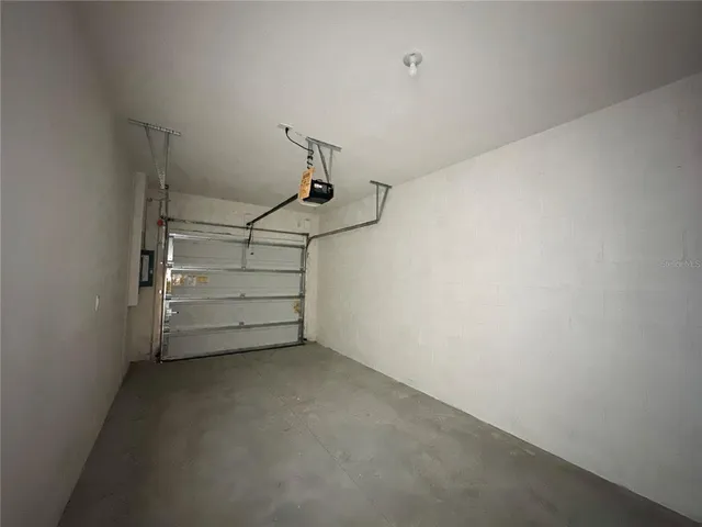 a view of a hallway with staircase