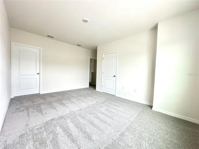 a view of a room with racks on the wall