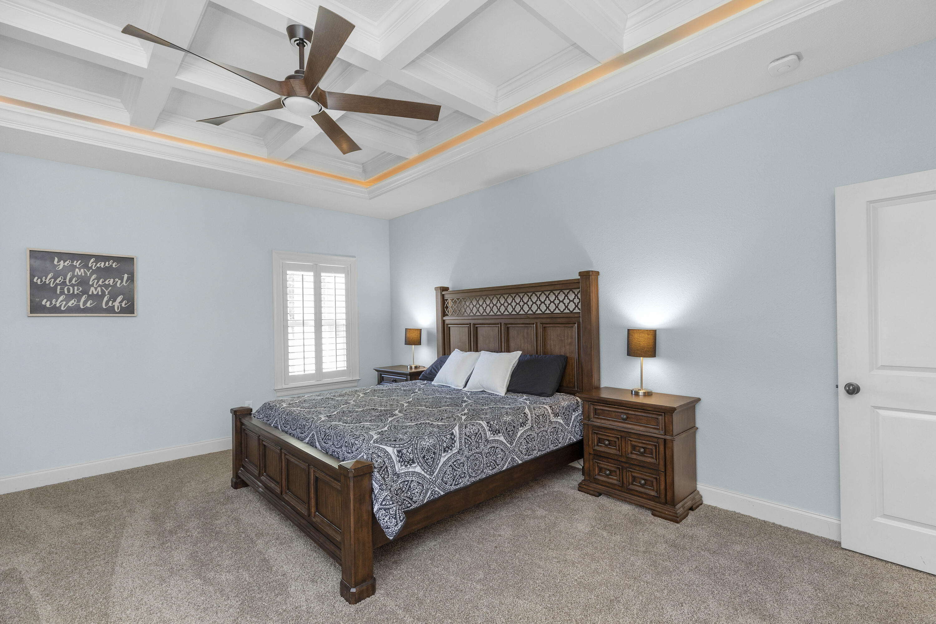 2946 Chantry Circle Crestview, FL 32539 - Photo 27 of 55 a bedroom with a bed and a chandelier
