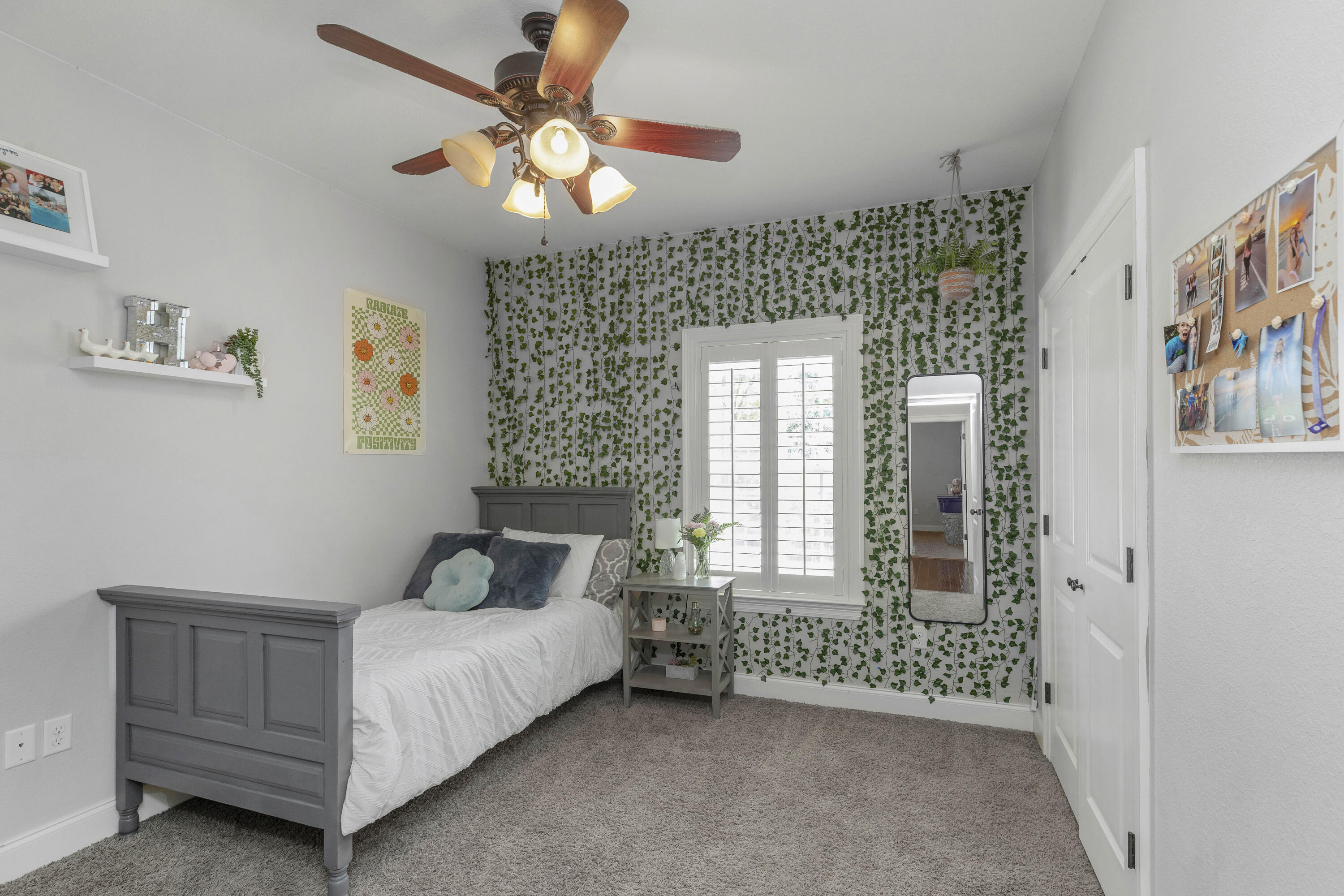 2946 Chantry Circle Crestview, FL 32539 - Photo 35 of 55 a bedroom with a bed and a chandelier