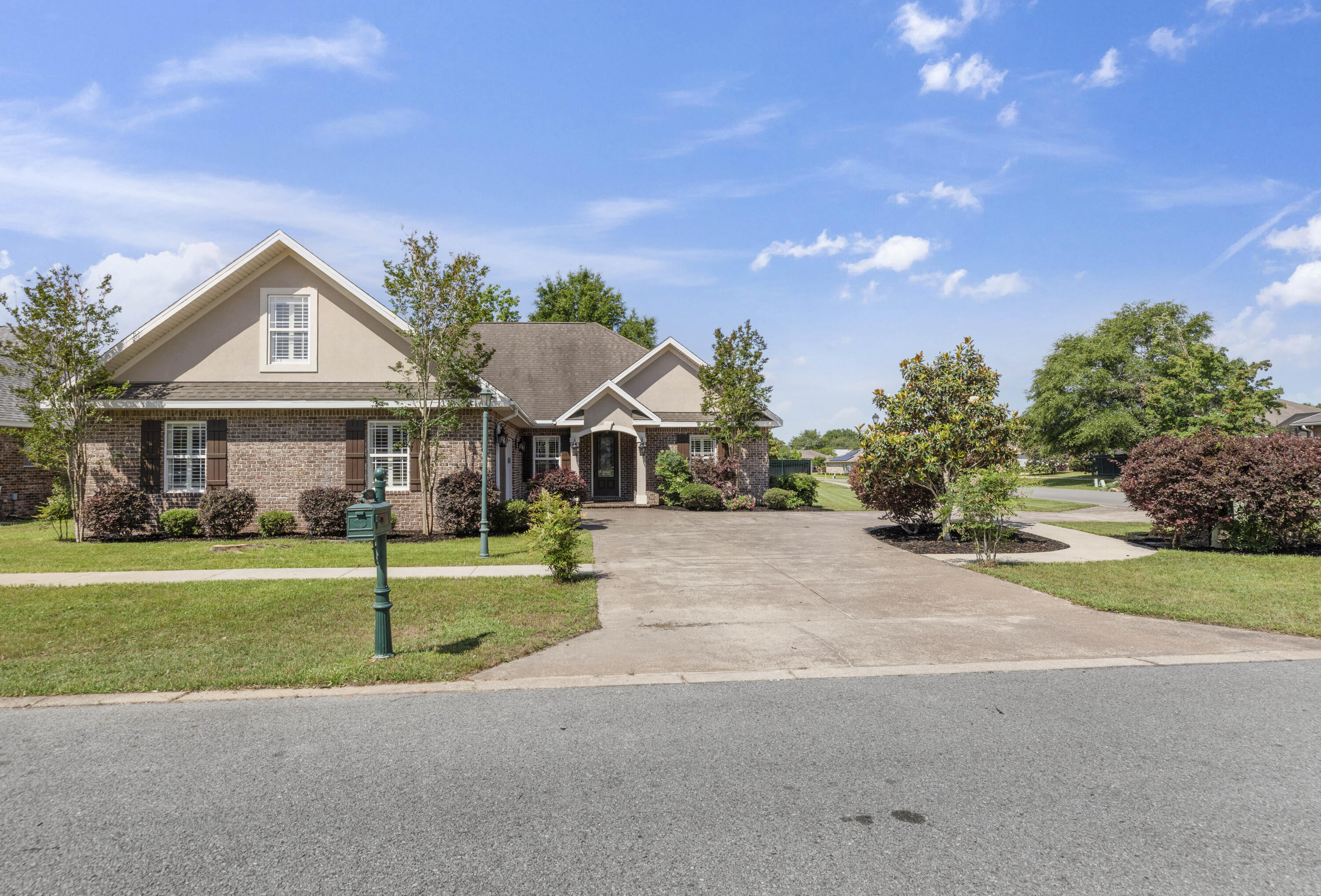 2946 Chantry Circle Crestview, FL 32539 - Photo 4 of 55 a front view of house with yard and green space