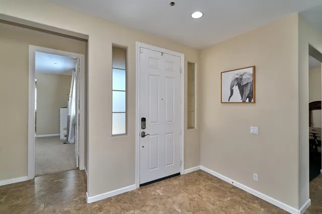 a room with pool table and a table