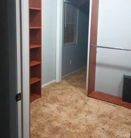 a view of empty room with windows