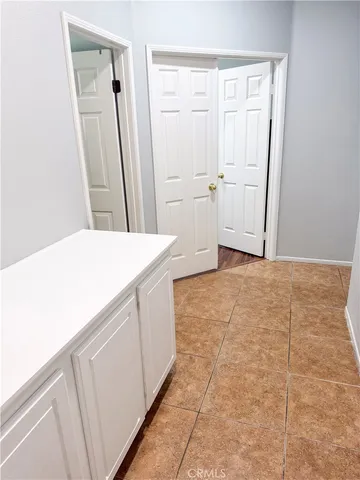 a utility room with a sink dryer and washer