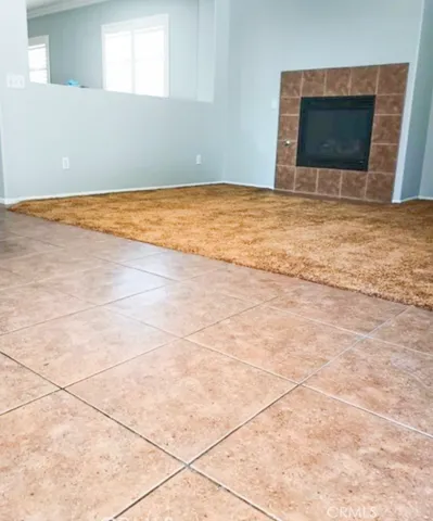a view of balcony with wooden floor