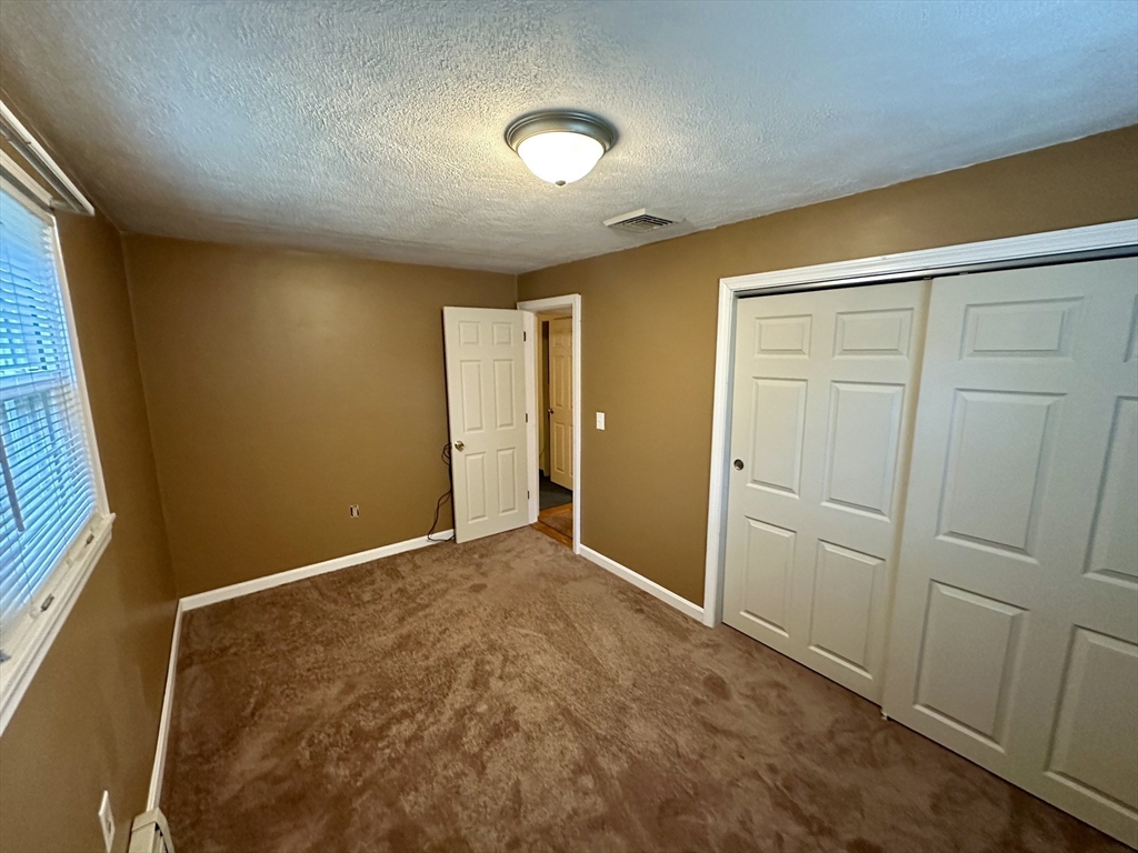 64 Maplewood Drive Townsend, MA 01469 - Photo 11 of 18 a view of an empty room