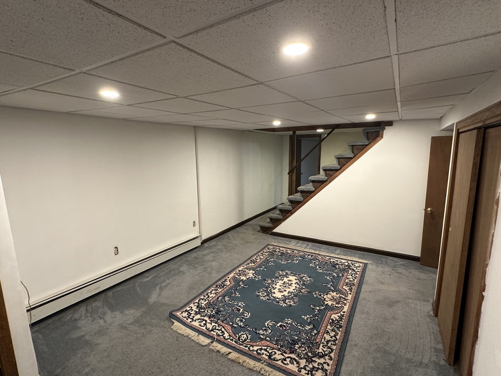64 Maplewood Drive Townsend, MA 01469 - Photo 15 of 18 an empty room with wooden floor