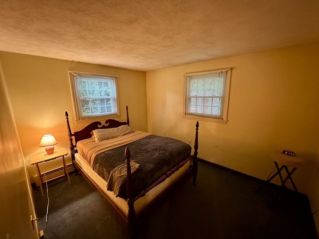 64 Maplewood Drive Townsend, MA 01469 - Photo 10 of 18 a bedroom with a bed and a window