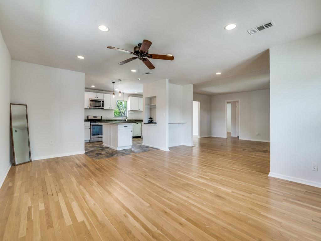 2315 Inadale Avenue Dallas, TX 75228 - Photo 6 of 36 a view of a kitchen with a sink and wooden floor