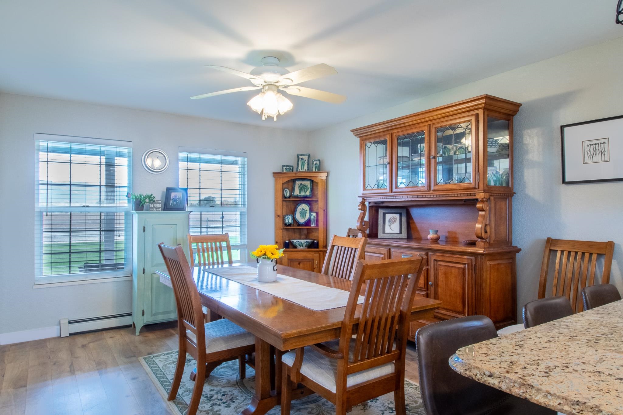 273 30 Road Grand Junction, CO 81503 - Photo 15 of 42 a view of a dining room with furniture window and wooden floor