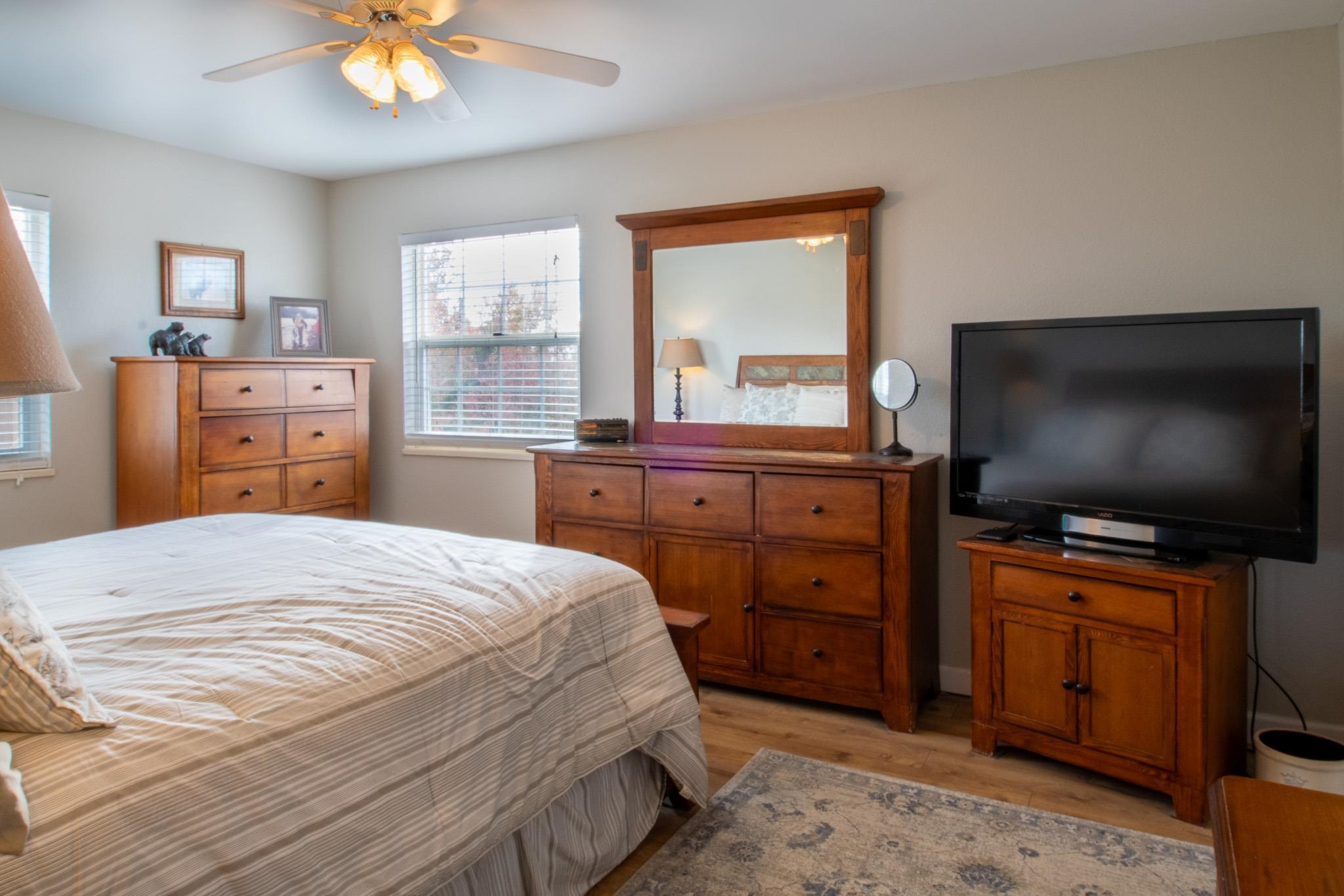 273 30 Road Grand Junction, CO 81503 - Photo 19 of 42 a bedroom with a bed and a flat screen tv